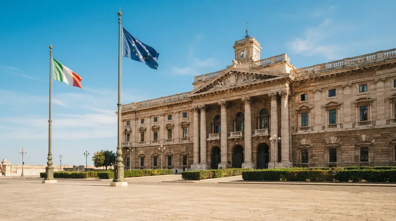 Palazzo istituzionale con bandiere al vento in una piazza soleggiata — casino non aams affidabili